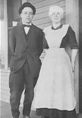 Victorian butler/housekeeper couple